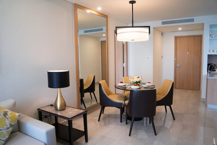 Bright apartment living and dining area with clean finishes, illustrating specifications at Serene Sagara